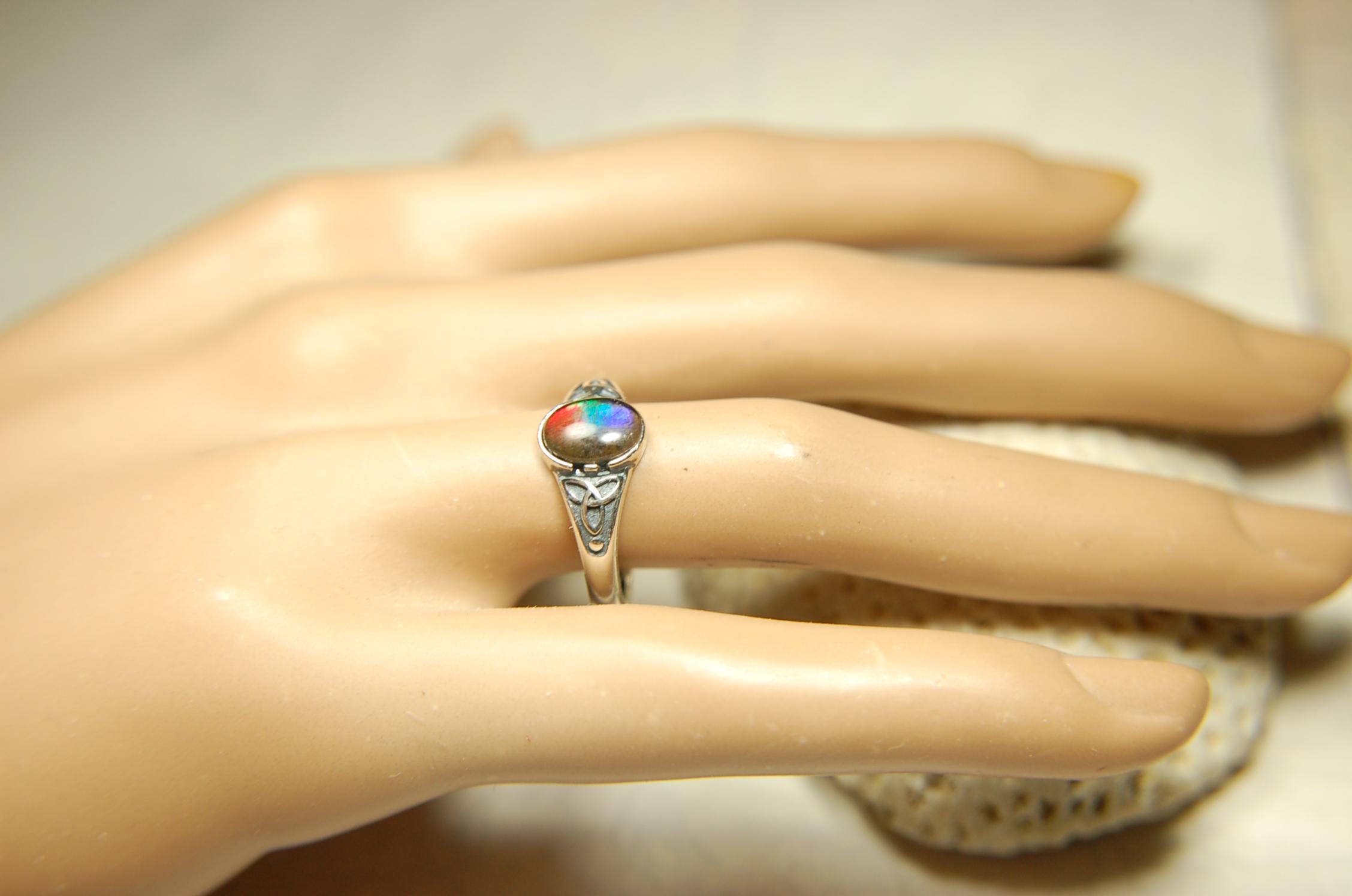 Ammolite Ladies Ring.Sterling Silver.Very feminine, has Celtic design and is in your size too!Brilliant tricolor gem.Gift for her?030816