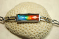 Ammolite Jewelry bracelet.Bright faceted gem shipped free.No import tax to US under CUSMA exemption #070614