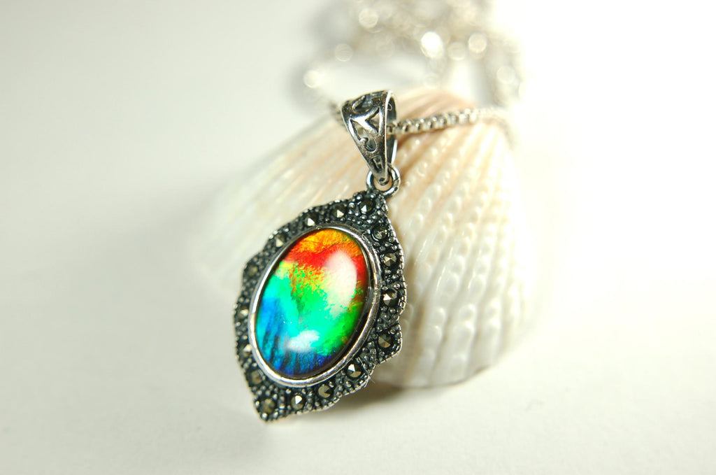 Ammolite jewelry pendant-a wifes birthgay gift Idea she will treasure.Genuine high quality ammolite mined and shipped from Canada.013115
