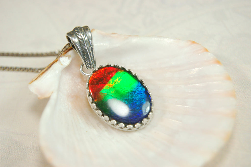 Colorful ammolite pendant - a one-of-a-kind addition to your collection or a perfect gift for someone special"021224
