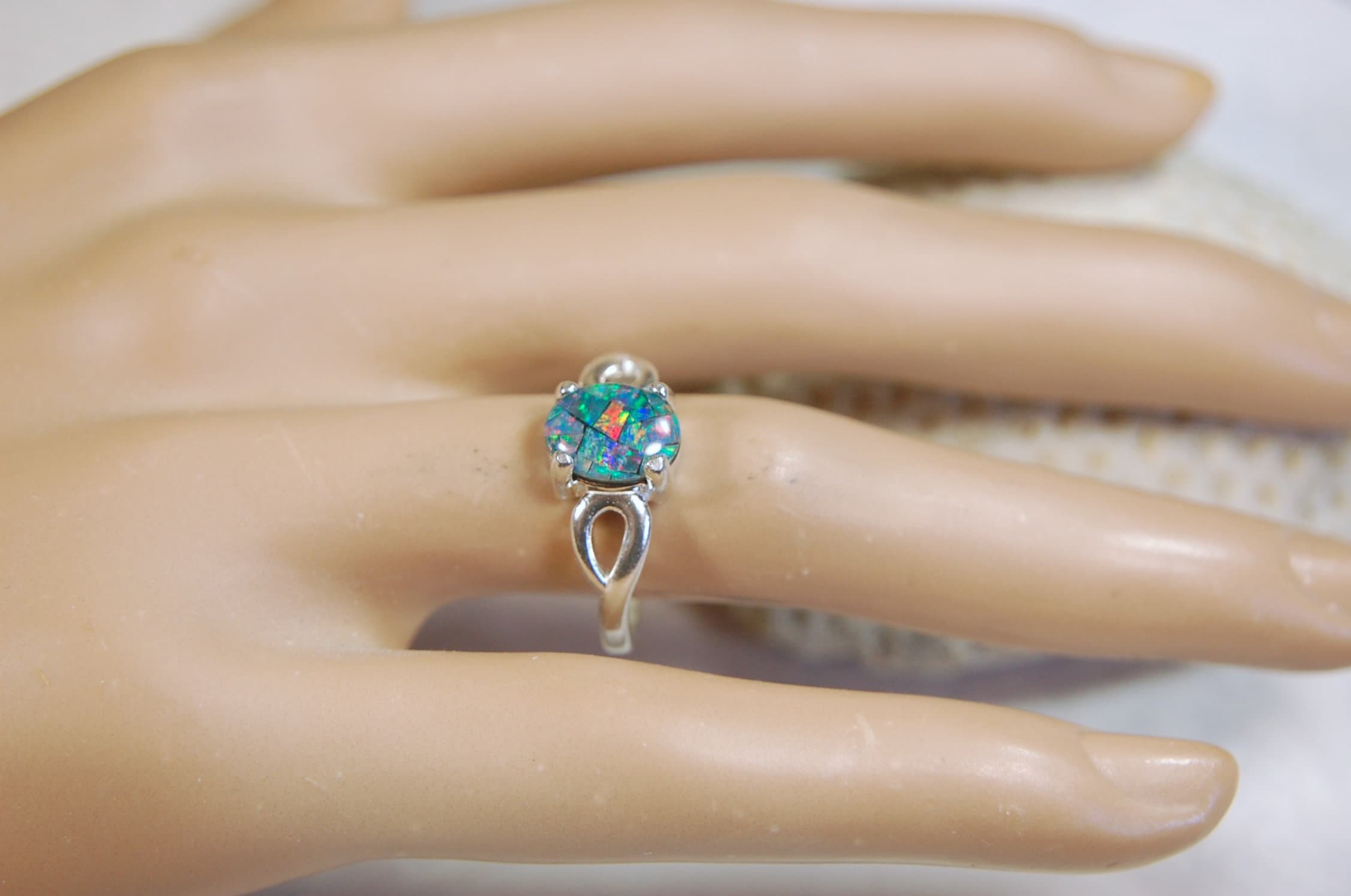 Australian Opal Ring.Gorgeous colors. Set in Sterling Silver.The perfect gift.Size 7 Boho style.