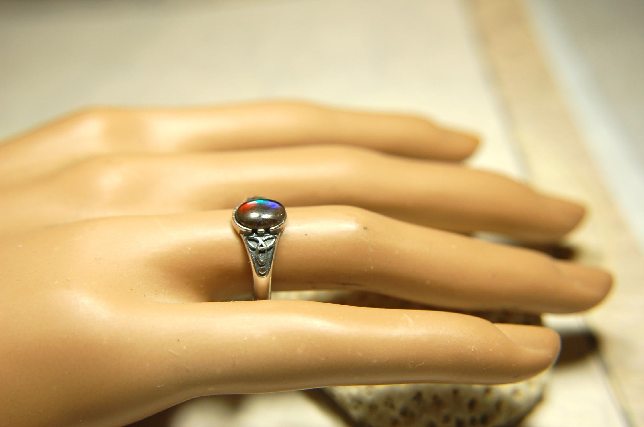 Ammolite Ladies Ring.Sterling Silver.Very feminine, has Celtic design and is in your size too!Brilliant tricolor gem.Gift for her?030816