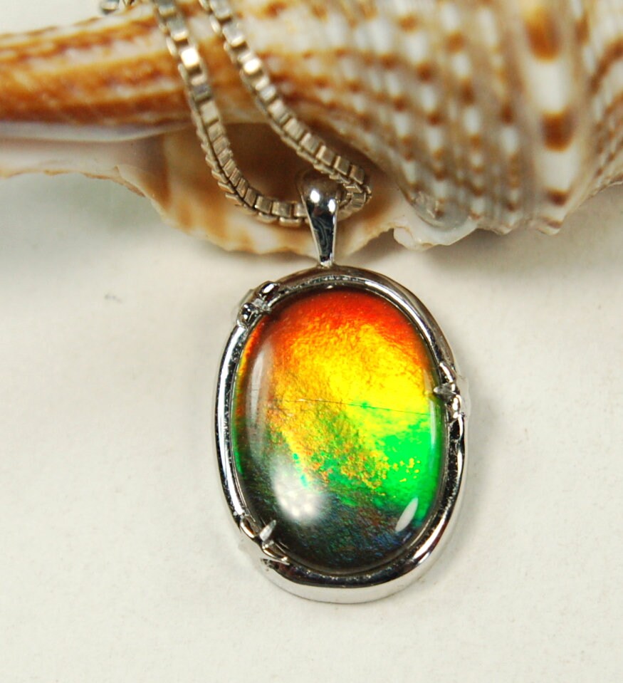 Ammolite Jewelry pendant with lovely rich colors that amaze.Canadian ammolite.Ammolite jewelry at its best.Ammolite from Canada.#051012