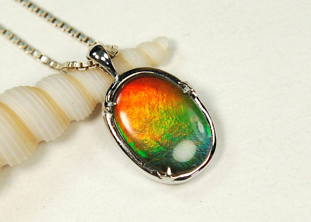 Ammolite Jewelry pendant with lovely rich colors that amaze.Canadian ammolite.Ammolite jewelry at its best.Ammolite from Canada.#051012