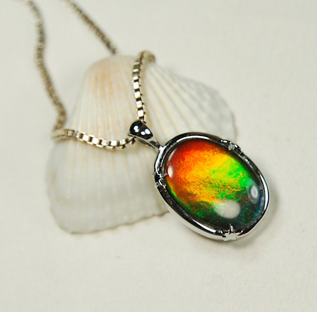 Ammolite Jewelry pendant with lovely rich colors that amaze.Canadian ammolite.Ammolite jewelry at its best.Ammolite from Canada.#051012