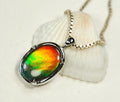 Ammolite Jewelry pendant with lovely rich colors that amaze.Canadian ammolite.Ammolite jewelry at its best.Ammolite from Canada.#051012