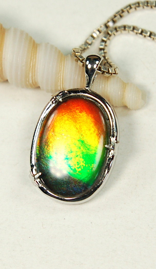 Ammolite Jewelry pendant with lovely rich colors that amaze.Canadian ammolite.Ammolite jewelry at its best.Ammolite from Canada.#051012