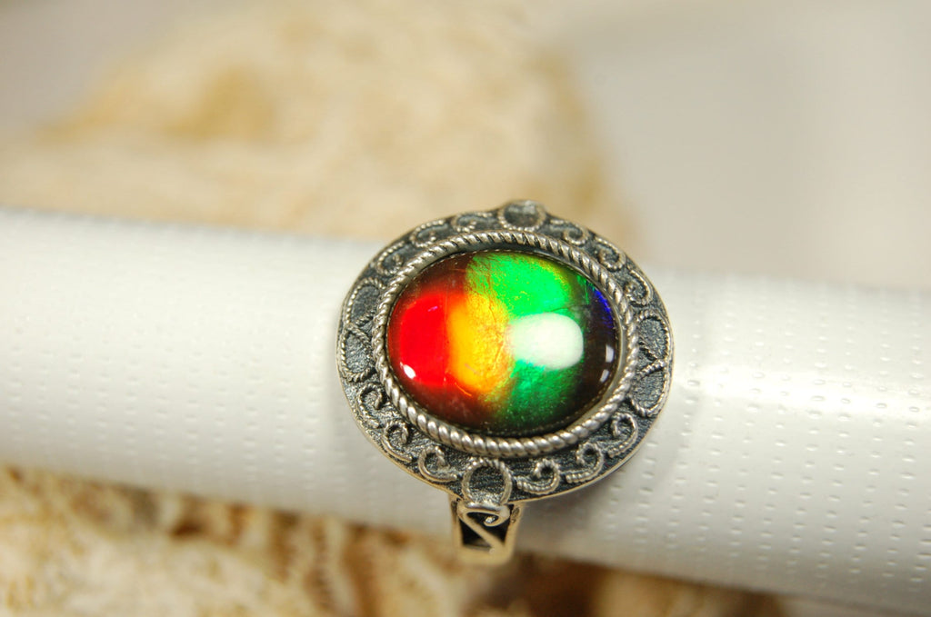 Ammolte Ring.Universal Fit.We pay to Fedex to you.Tax exempt under CUSMA rules.#021913