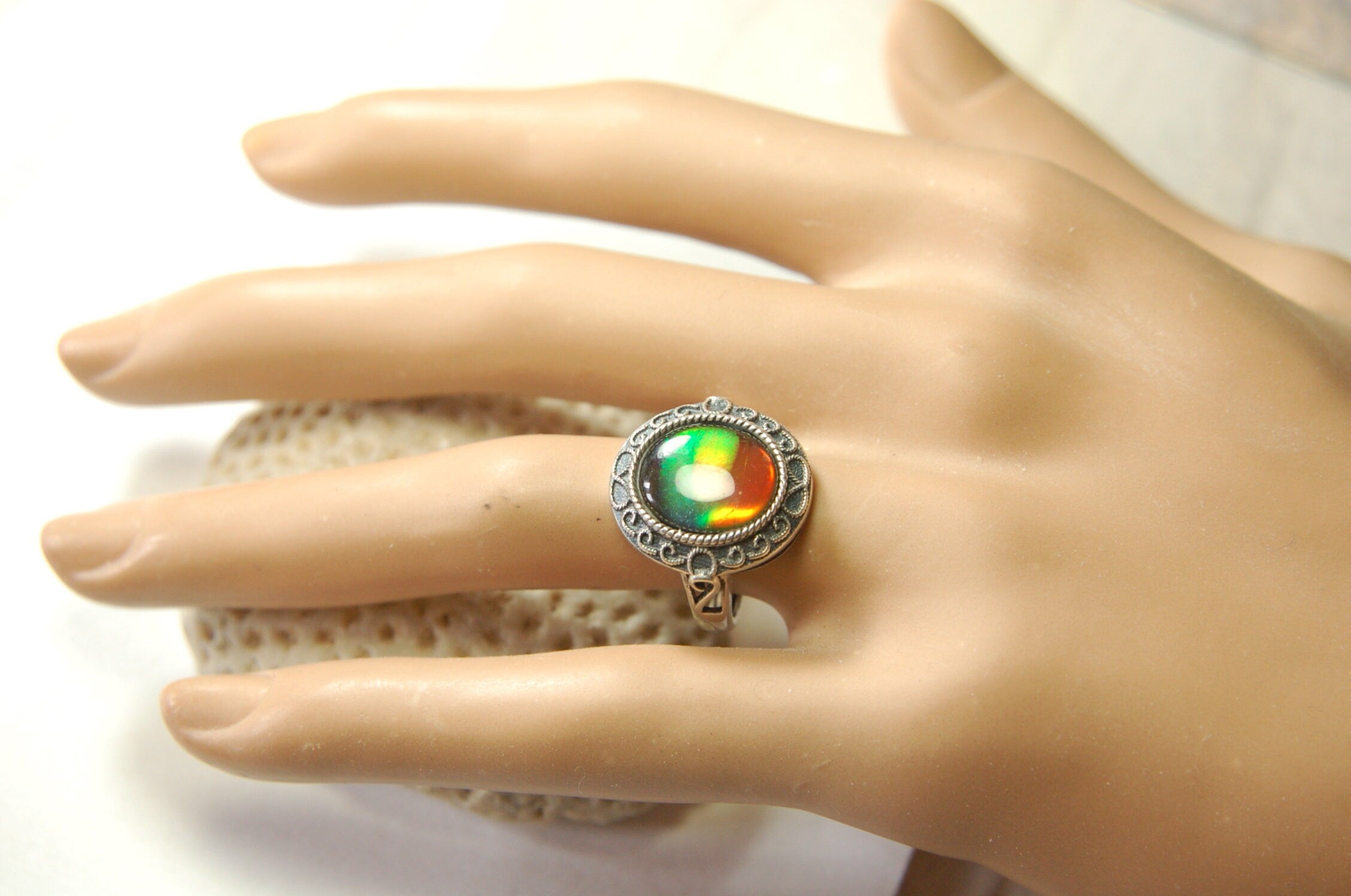 Ammolte Ring.Universal Fit.We pay to Fedex to you.Tax exempt under CUSMA rules.#021913