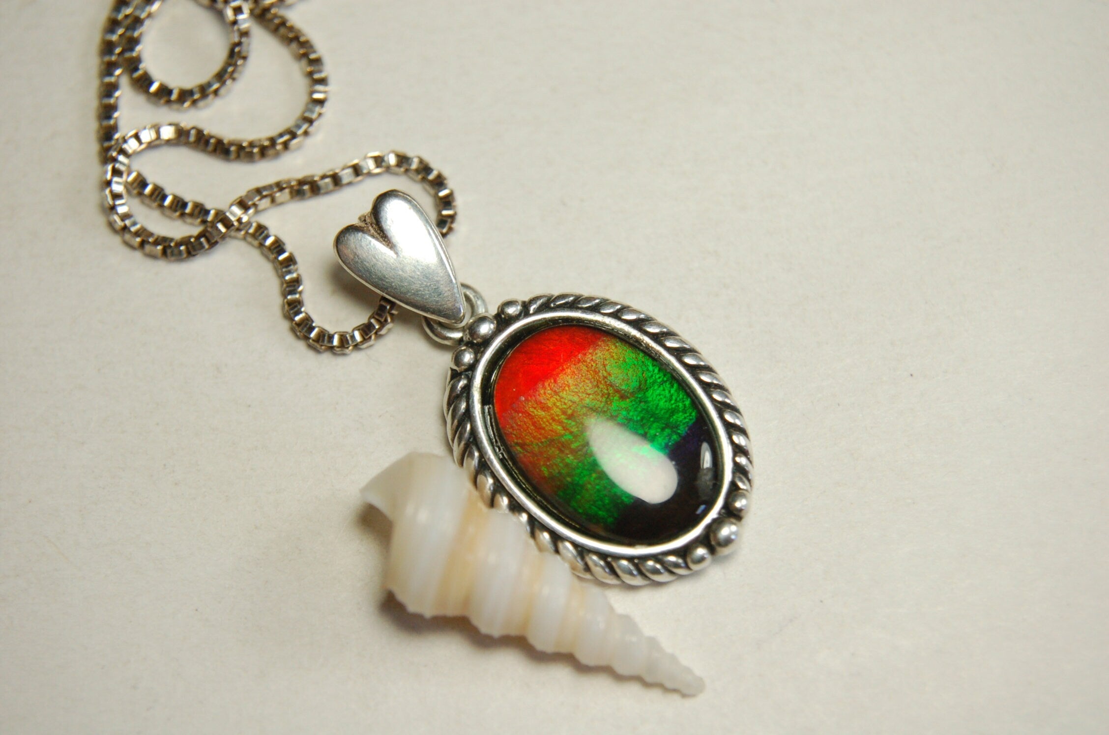 Ammolite pendant conveys a loving heartfelt message.Ammolite jewelry.Four color Rainbow ammolite.Ammolite necklace.Canadian ammolite.100301