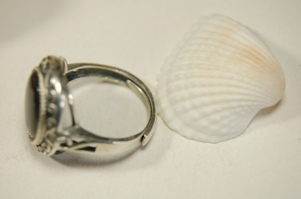 Ammolte Ring.Universal Fit.We pay to Fedex to you.Tax exempt under CUSMA rules.#021913