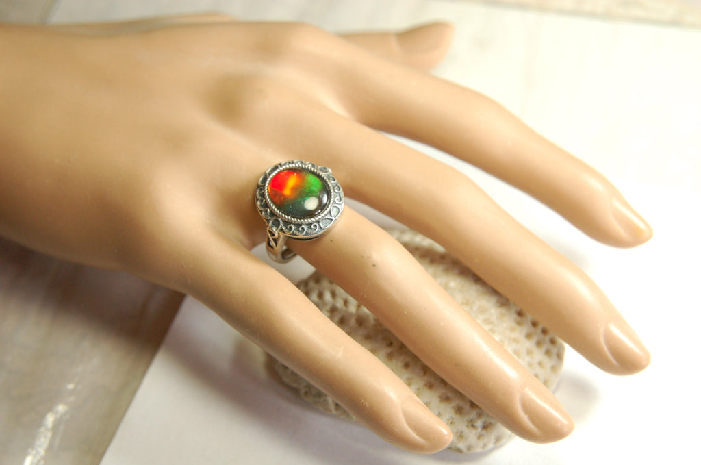 Ammolte Ring.Universal Fit.We pay to Fedex to you.Tax exempt under CUSMA rules.#021913