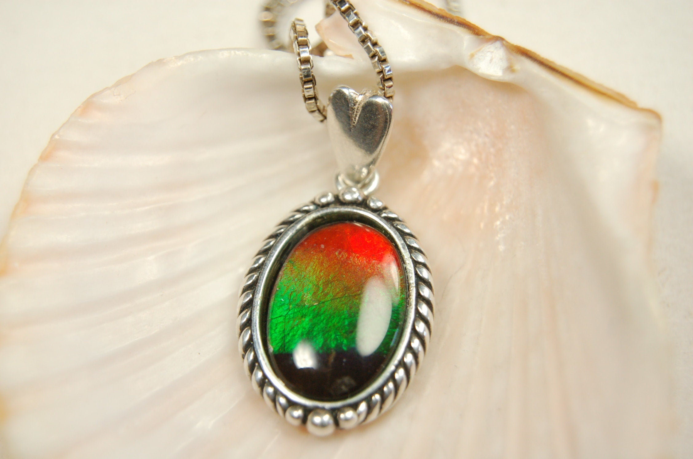 Ammolite pendant conveys a loving heartfelt message.Ammolite jewelry.Four color Rainbow ammolite.Ammolite necklace.Canadian ammolite.100301