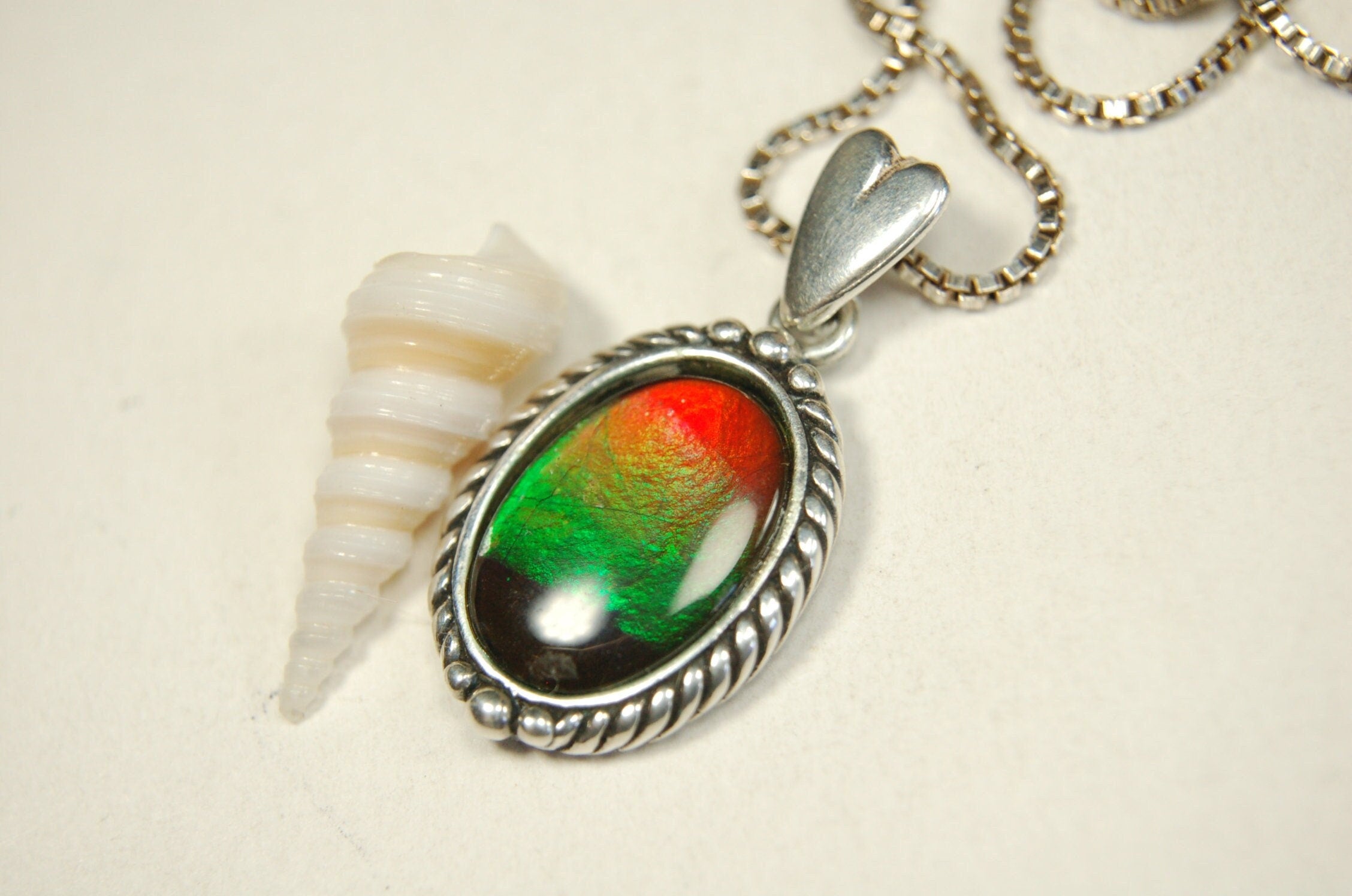 Ammolite pendant conveys a loving heartfelt message.Ammolite jewelry.Four color Rainbow ammolite.Ammolite necklace.Canadian ammolite.100301