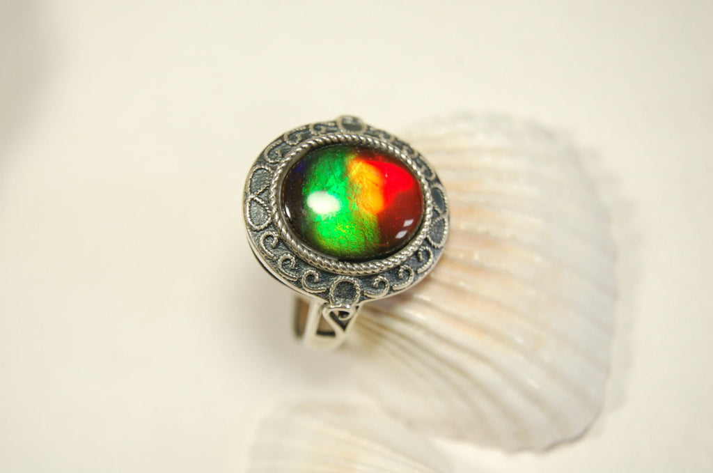 Ammolte Ring.Universal Fit.We pay to Fedex to you.Tax exempt under CUSMA rules.#021913
