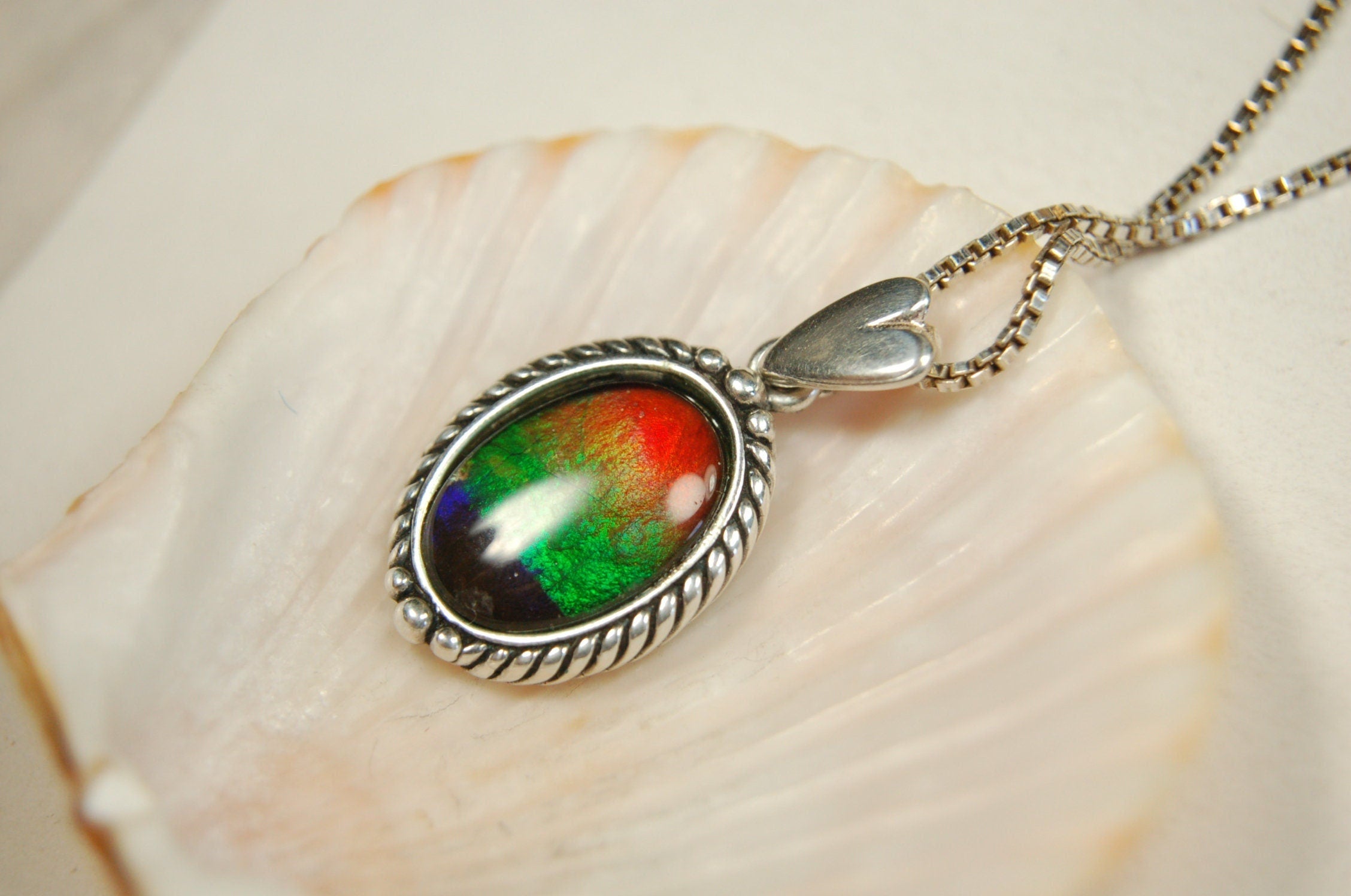 Ammolite pendant conveys a loving heartfelt message.Ammolite jewelry.Four color Rainbow ammolite.Ammolite necklace.Canadian ammolite.100301