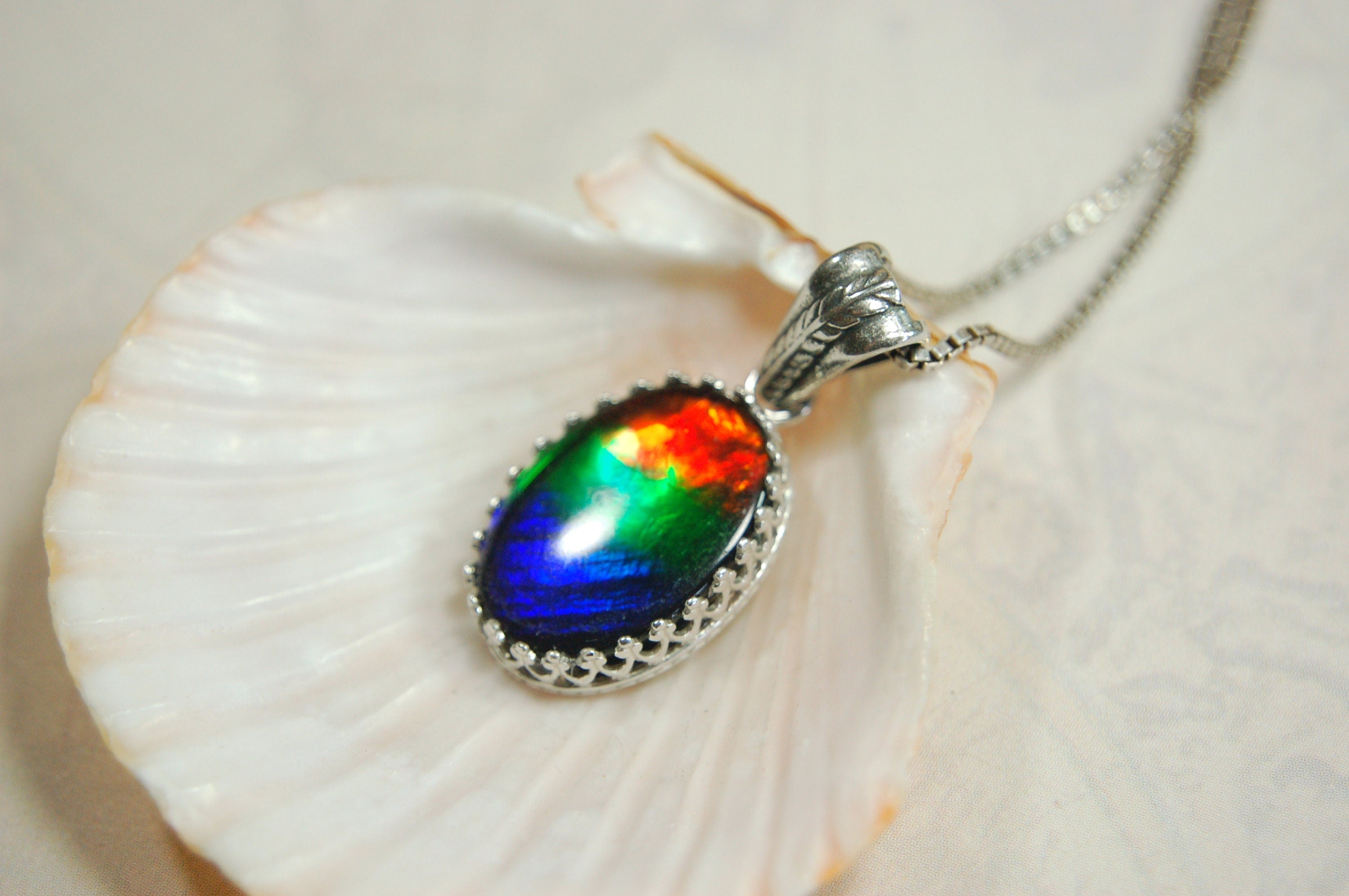 Colorful ammolite pendant - a one-of-a-kind addition to your collection or a perfect gift for someone special"021224
