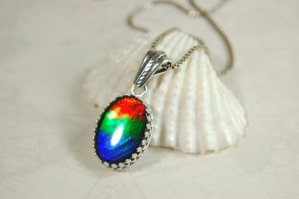 Colorful ammolite pendant - a one-of-a-kind addition to your collection or a perfect gift for someone special"021224