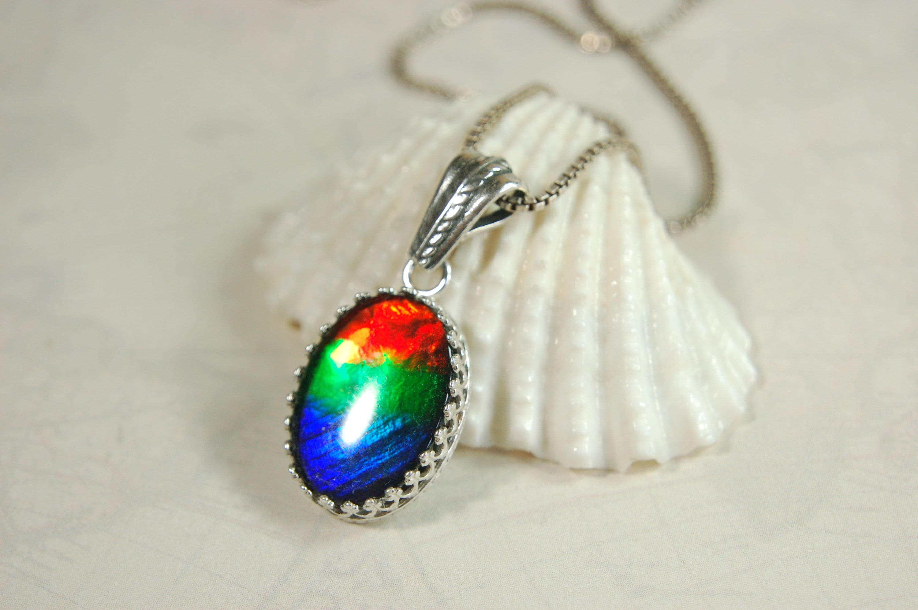 Colorful ammolite pendant - a one-of-a-kind addition to your collection or a perfect gift for someone special"021224