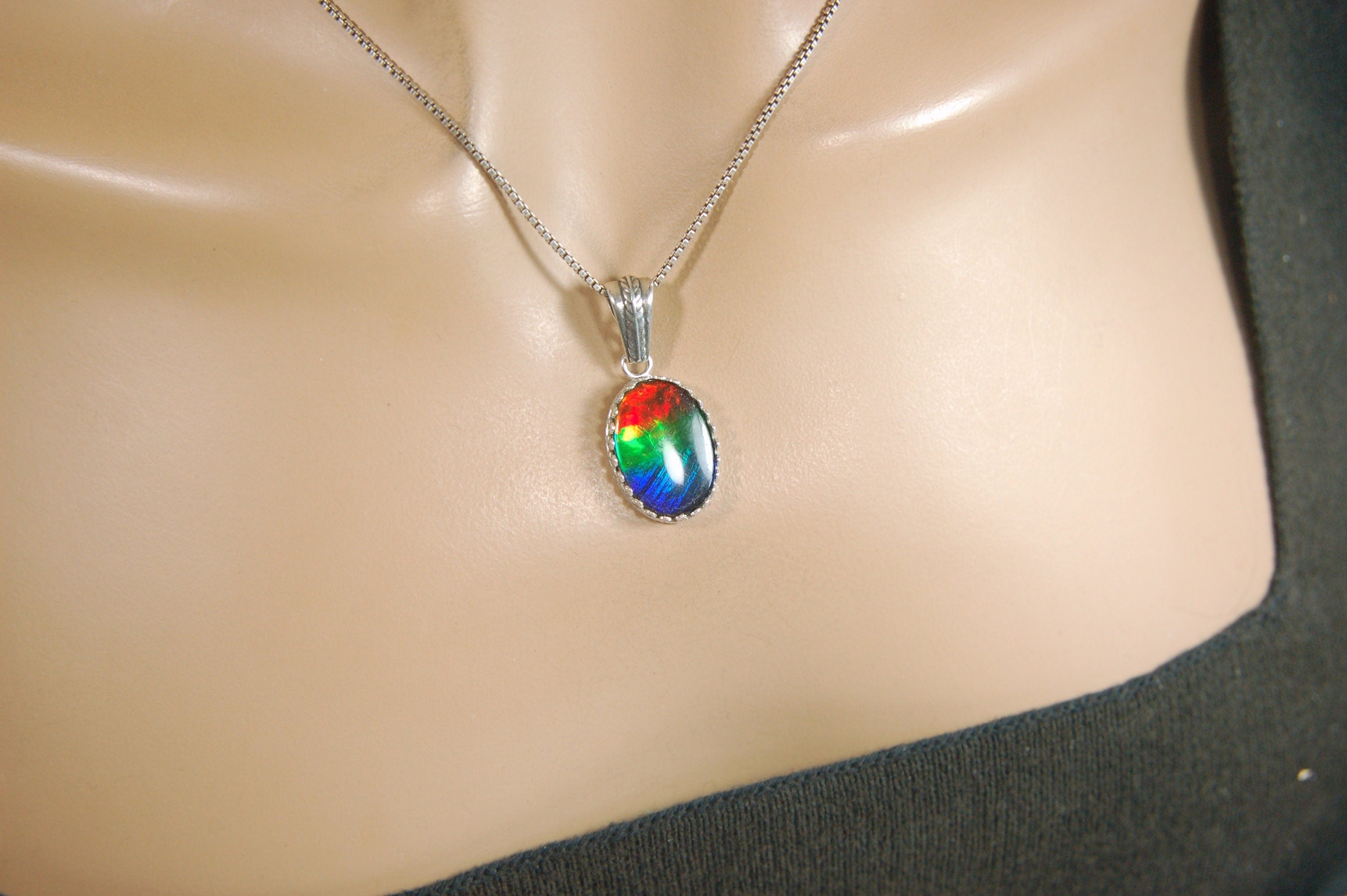 Colorful ammolite pendant - a one-of-a-kind addition to your collection or a perfect gift for someone special"021224