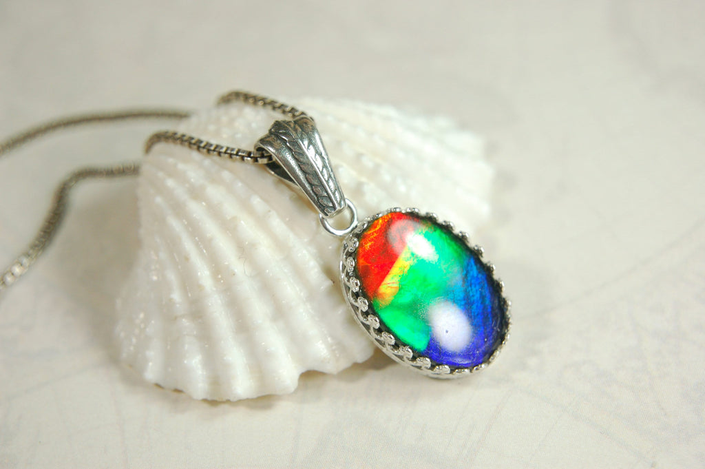 Colorful ammolite pendant - a one-of-a-kind addition to your collection or a perfect gift for someone special"021224