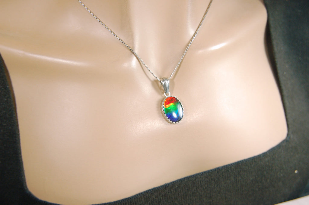 Colorful ammolite pendant - a one-of-a-kind addition to your collection or a perfect gift for someone special"021224