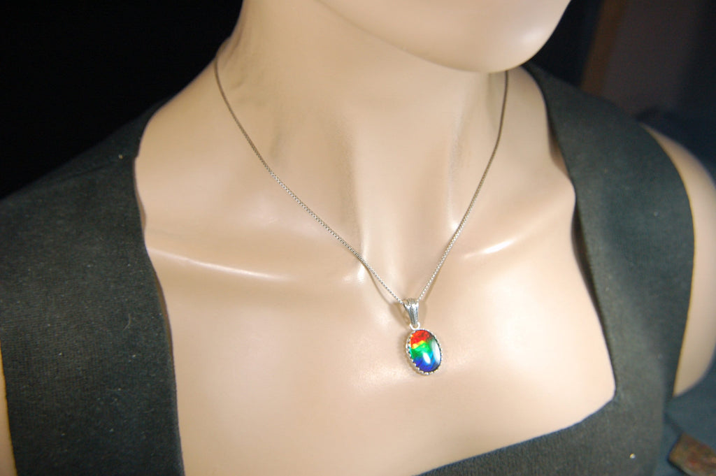 Colorful ammolite pendant - a one-of-a-kind addition to your collection or a perfect gift for someone special"021224