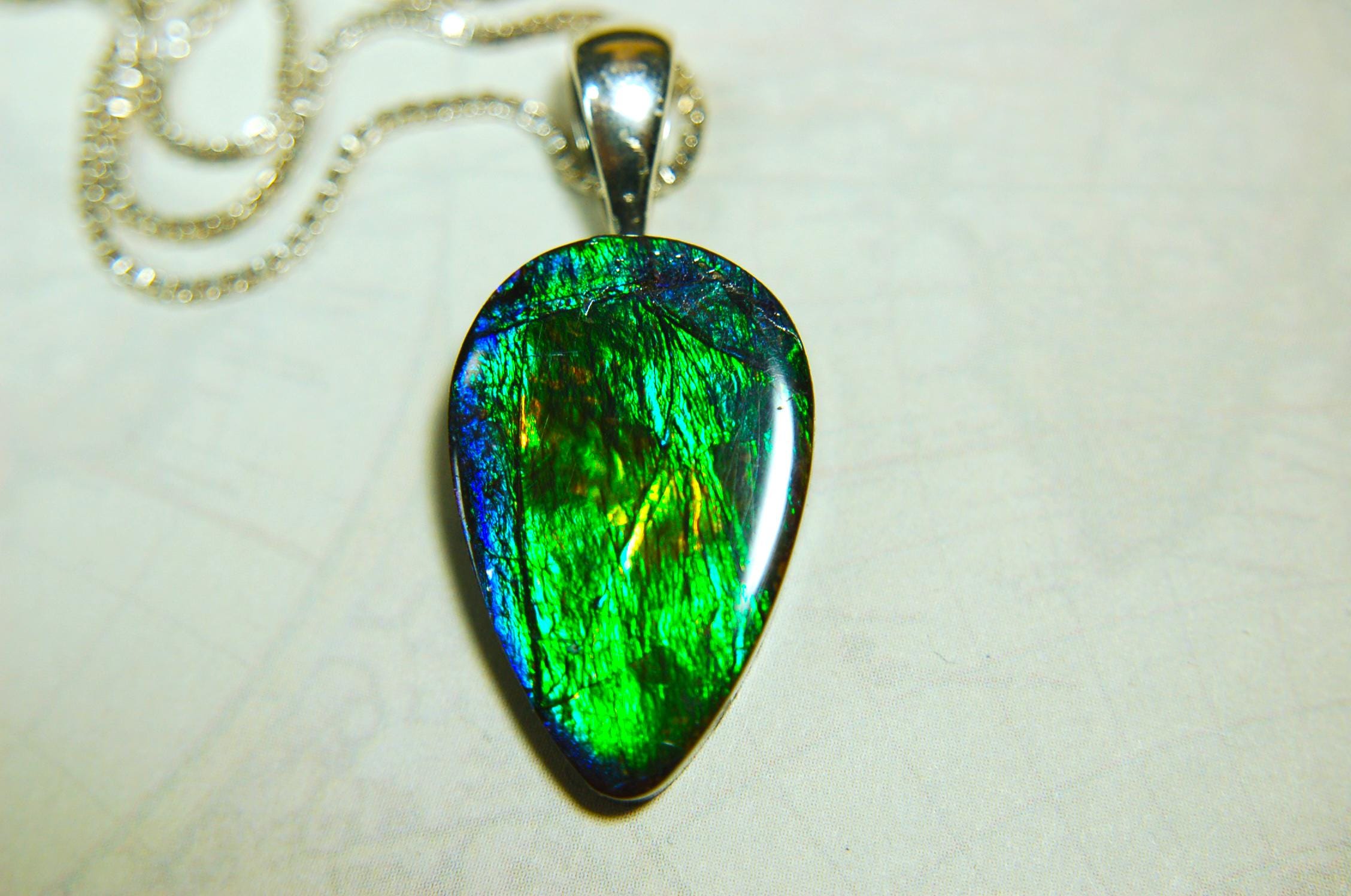 Ammolite Pendant with Peacock Colors.Natural Ammolite Jewelry Cabochon with vibrant changing colors.The perfect gift.Unisex Jewelry.021415