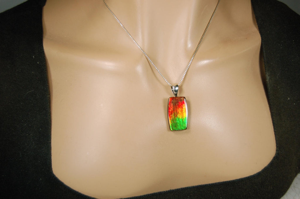 Spectacular Ammolite Pendant.Multicolor necklace.Quality Ammolite jewelry Gift.Unisex setting.Natural Cabochon Gem.MUST see video.062215