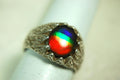 Ammolite Mens Ring of Four Colors.Size 11.Powerful Statement Ring in heavily carved Sterling Silver.Best seen in supplied video.061815
