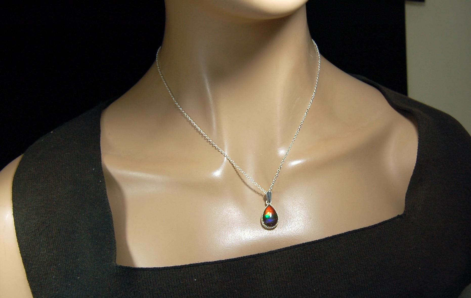 Dainty ammolite pendant.Brilliant color gem.Feminine jewelry.UniqueGift for her.Canadian gemstone.Sterling Silver setting.021126