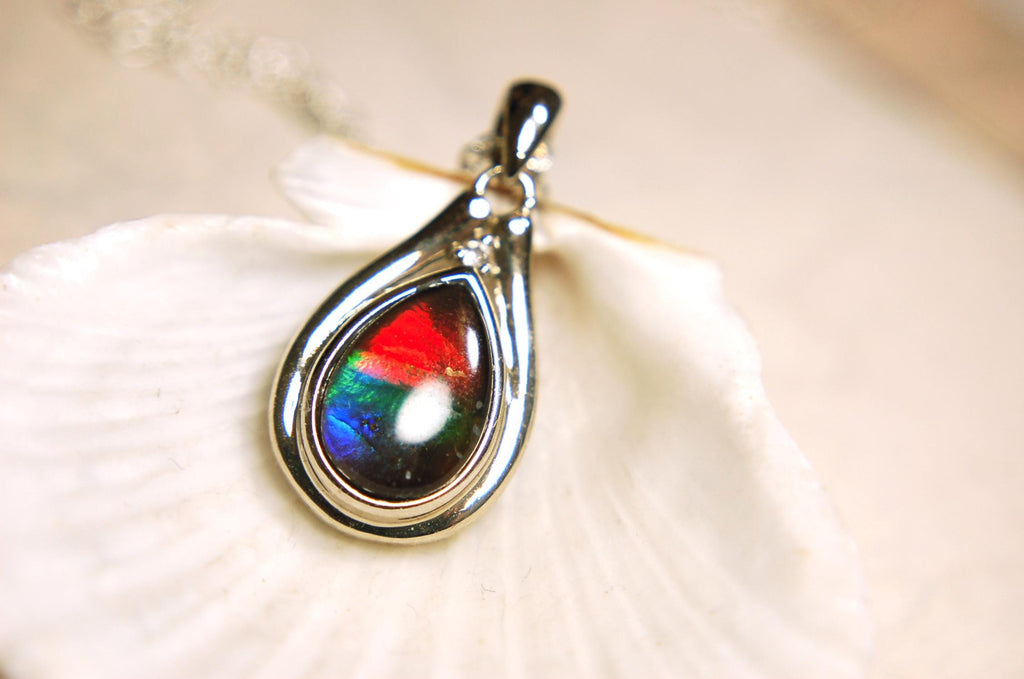 Ammolite pendant.Petite,feminine but very powerful.Rainbow color gem with sapphire.Birthday or Anniversary Gift for wife? 030416