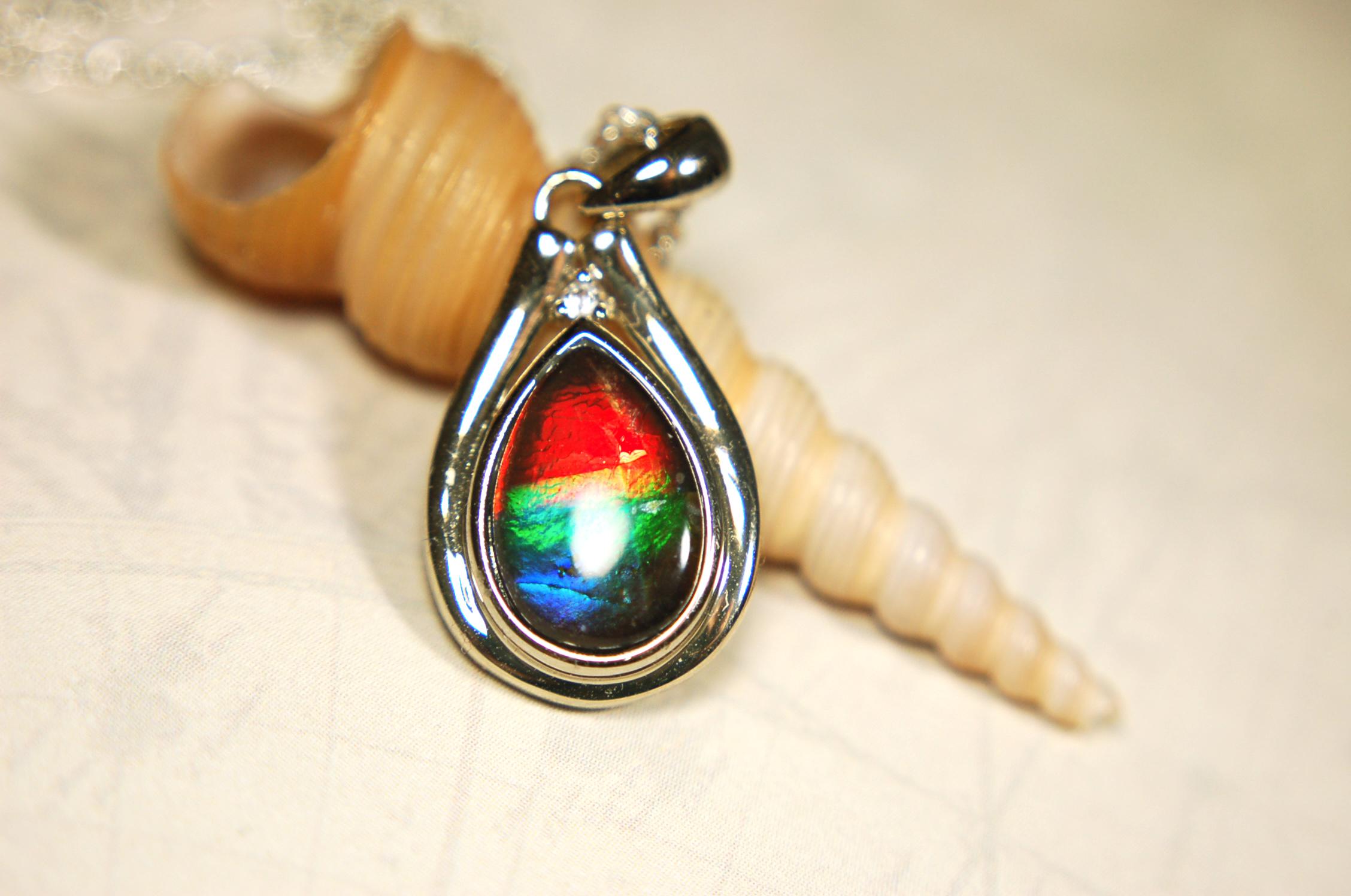 Ammolite pendant.Petite,feminine but very powerful.Rainbow color gem with sapphire.Birthday or Anniversary Gift for wife? 030416