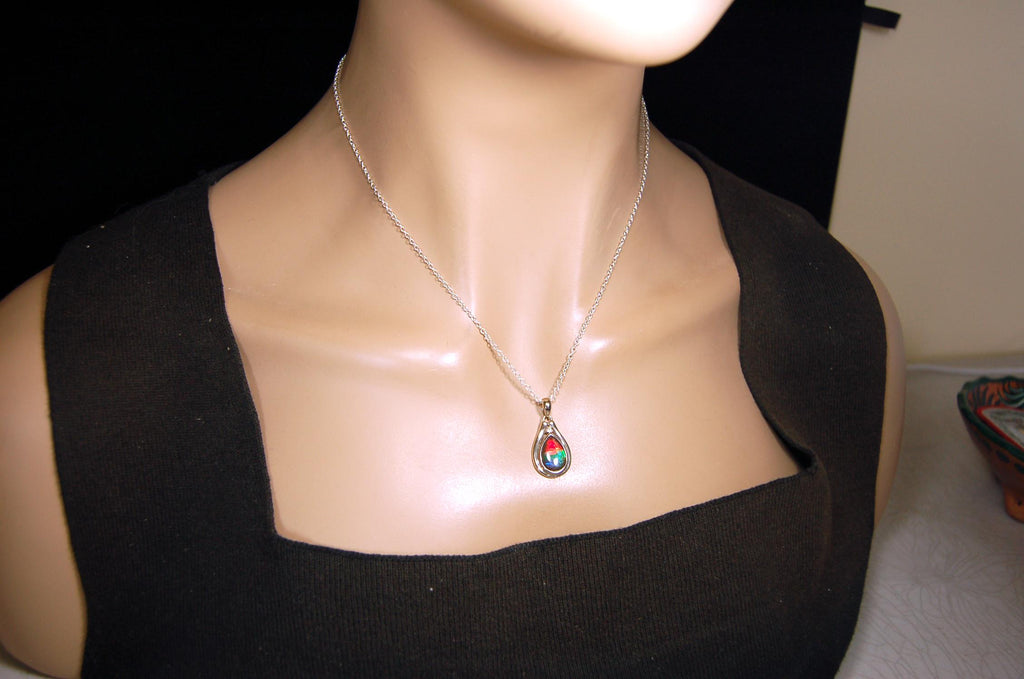Ammolite pendant.Petite,feminine but very powerful.Rainbow color gem with sapphire.Birthday or Anniversary Gift for wife? 030416
