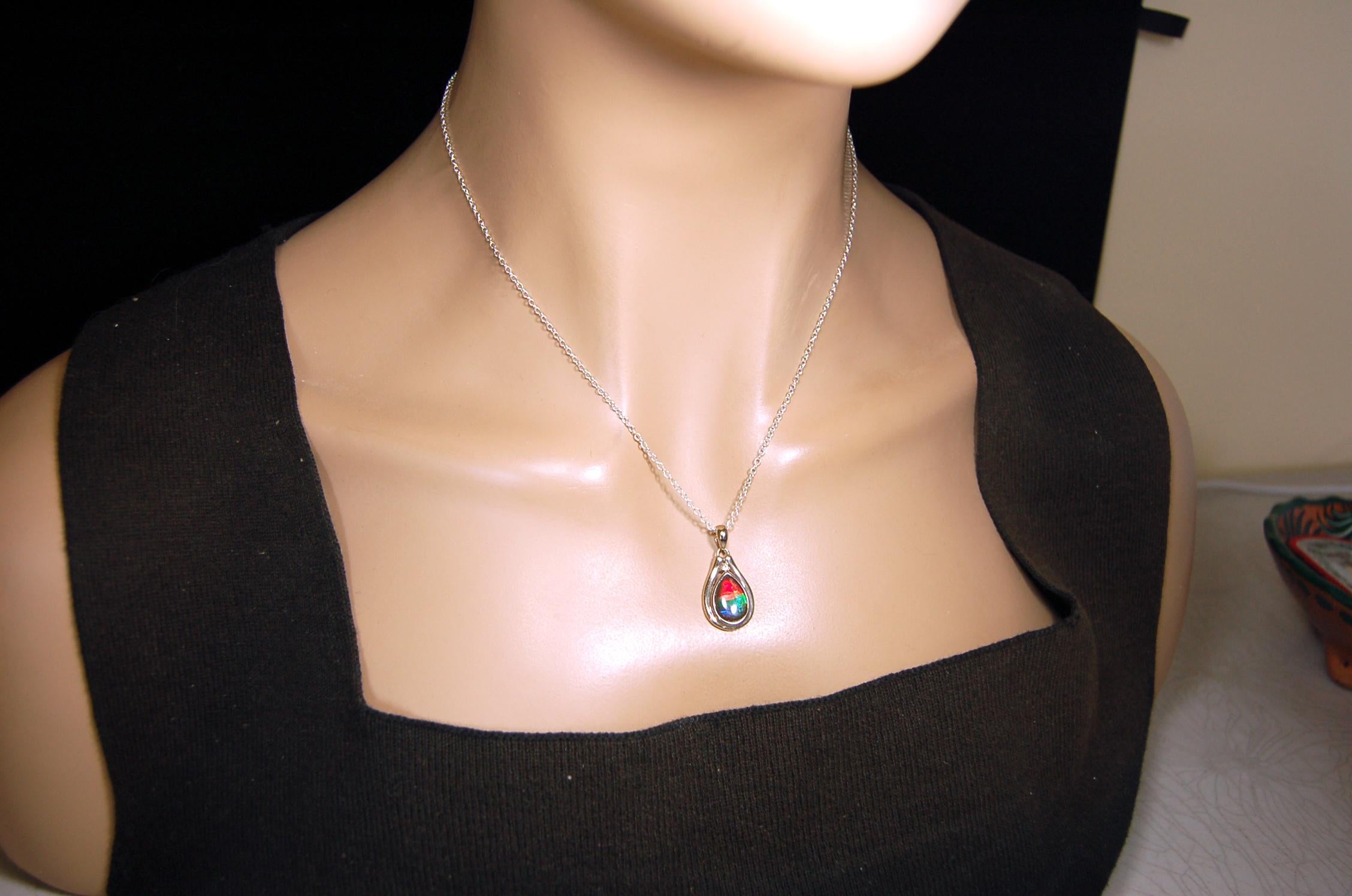 Ammolite pendant.Petite,feminine but very powerful.Rainbow color gem with sapphire.Birthday or Anniversary Gift for wife? 030416
