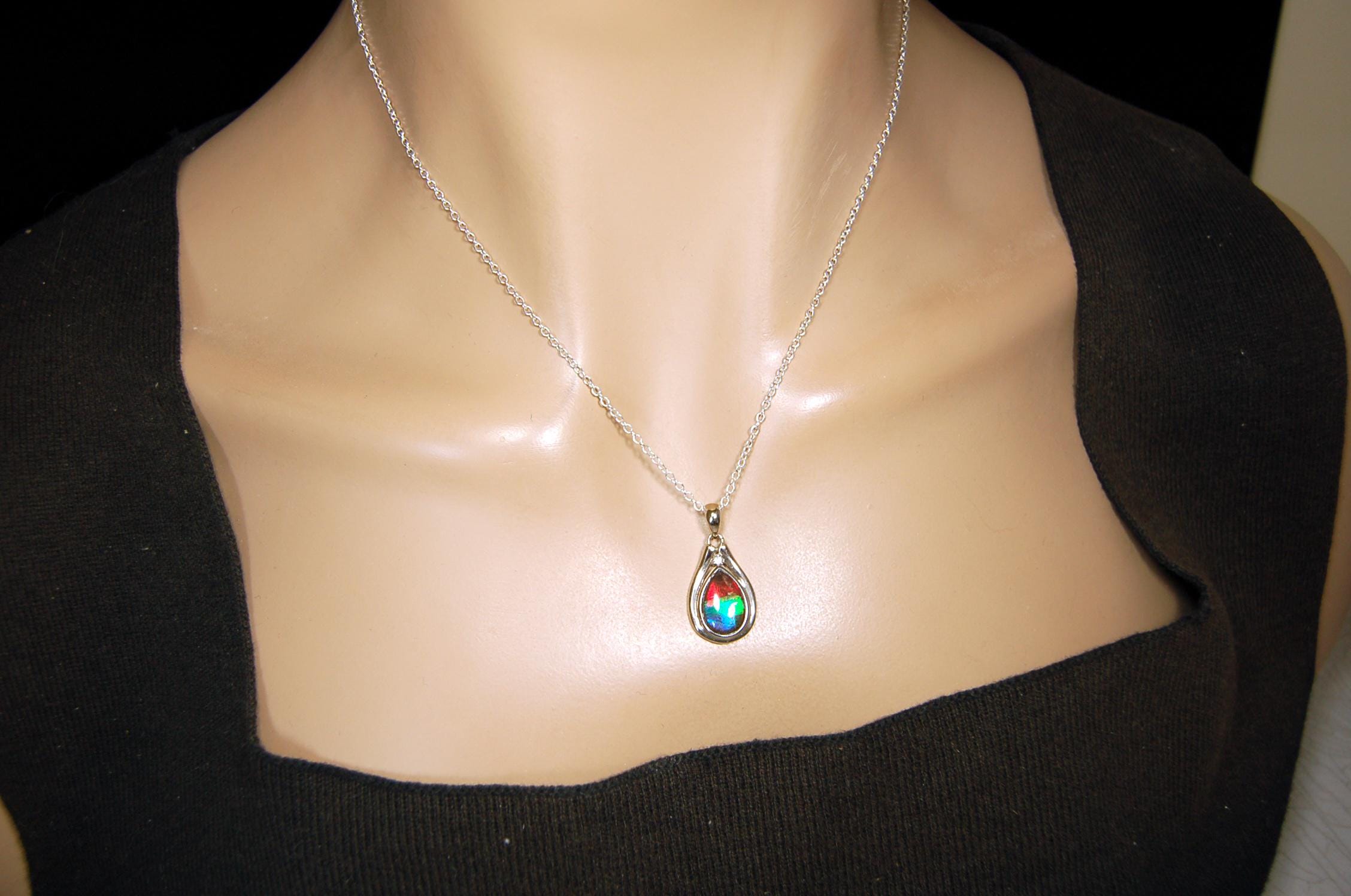 Ammolite pendant.Petite,feminine but very powerful.Rainbow color gem with sapphire.Birthday or Anniversary Gift for wife? 030416