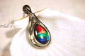 Ammolite pendant.Petite,feminine but very powerful.Rainbow color gem with sapphire.Birthday or Anniversary Gift for wife? 030416