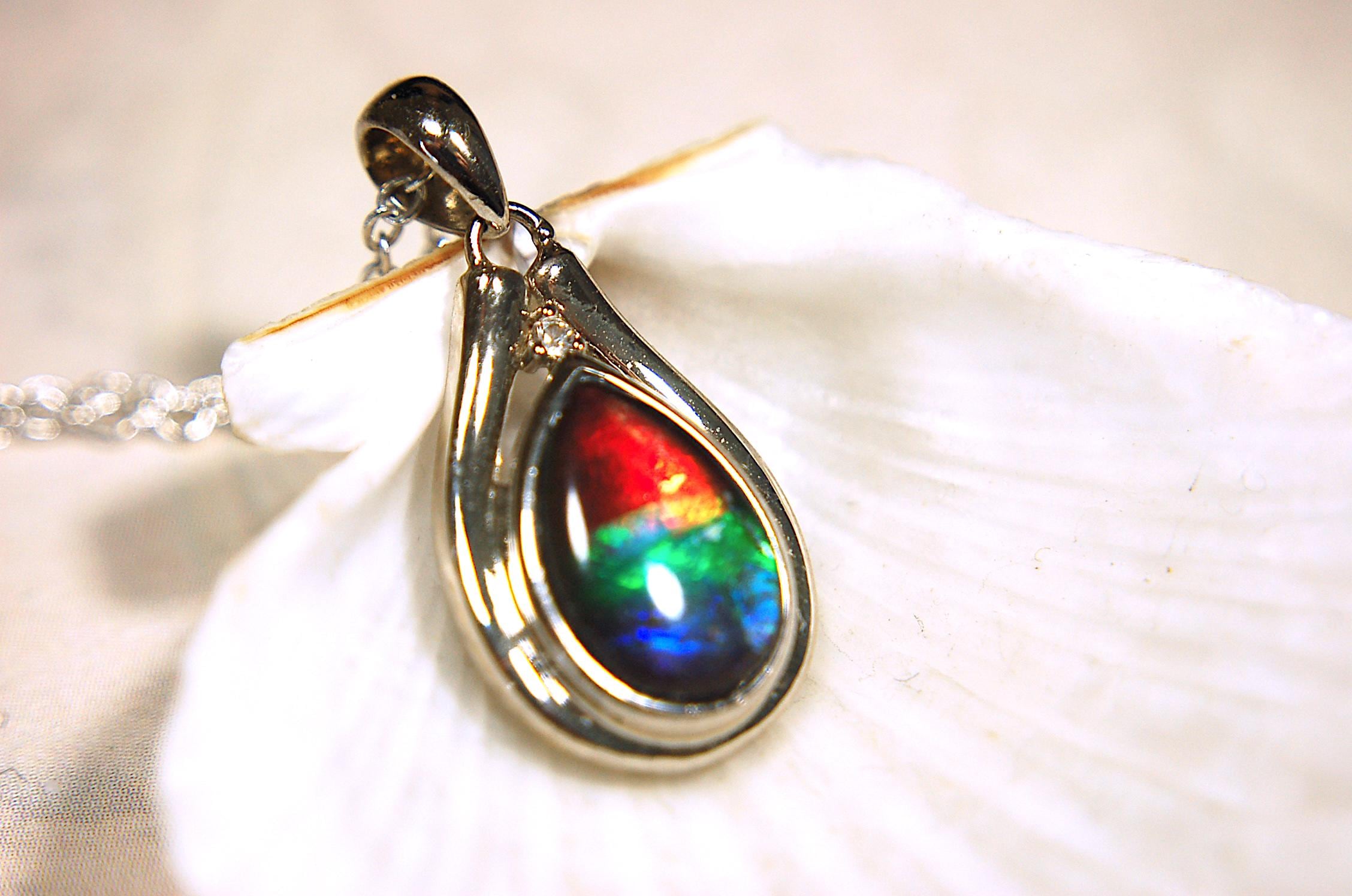 Ammolite pendant.Petite,feminine but very powerful.Rainbow color gem with sapphire.Birthday or Anniversary Gift for wife? 030416
