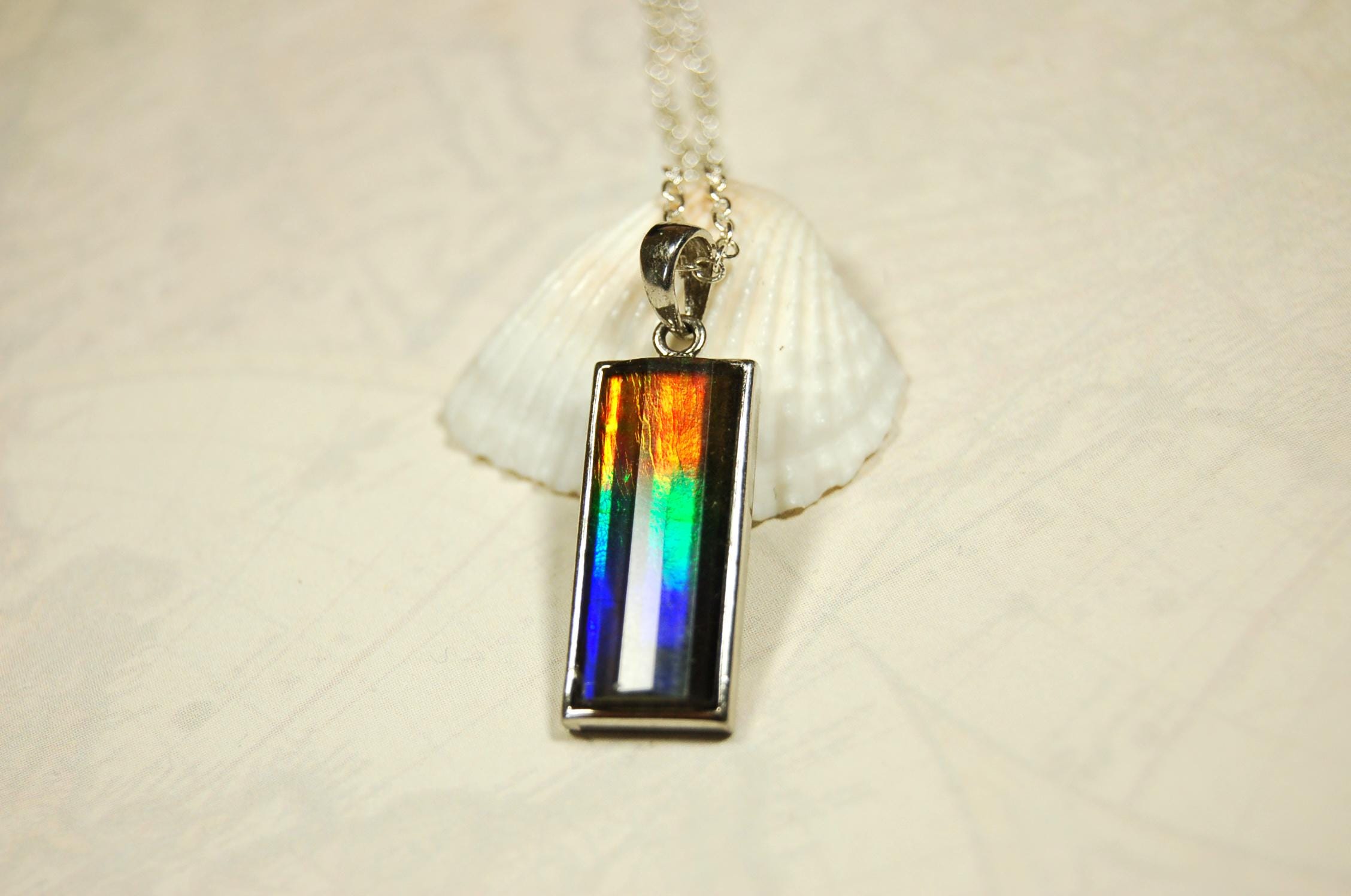 Unisex Jewelry.Ammolite Pendant.Bright Faceted rainbow gem.Price Reduced--see disclosure below in description