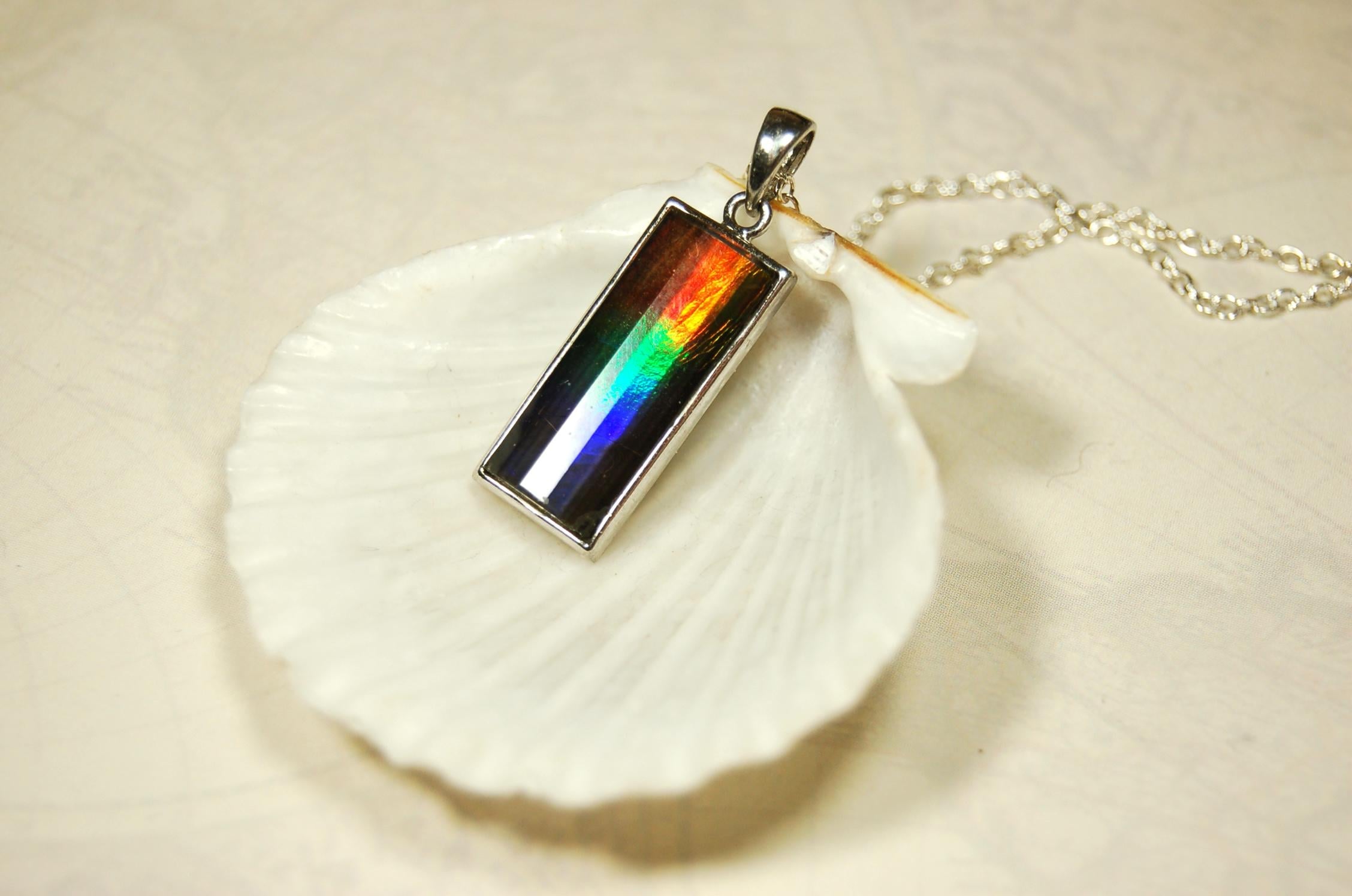 Unisex Jewelry.Ammolite Pendant.Bright Faceted rainbow gem.Price Reduced--see disclosure below in description