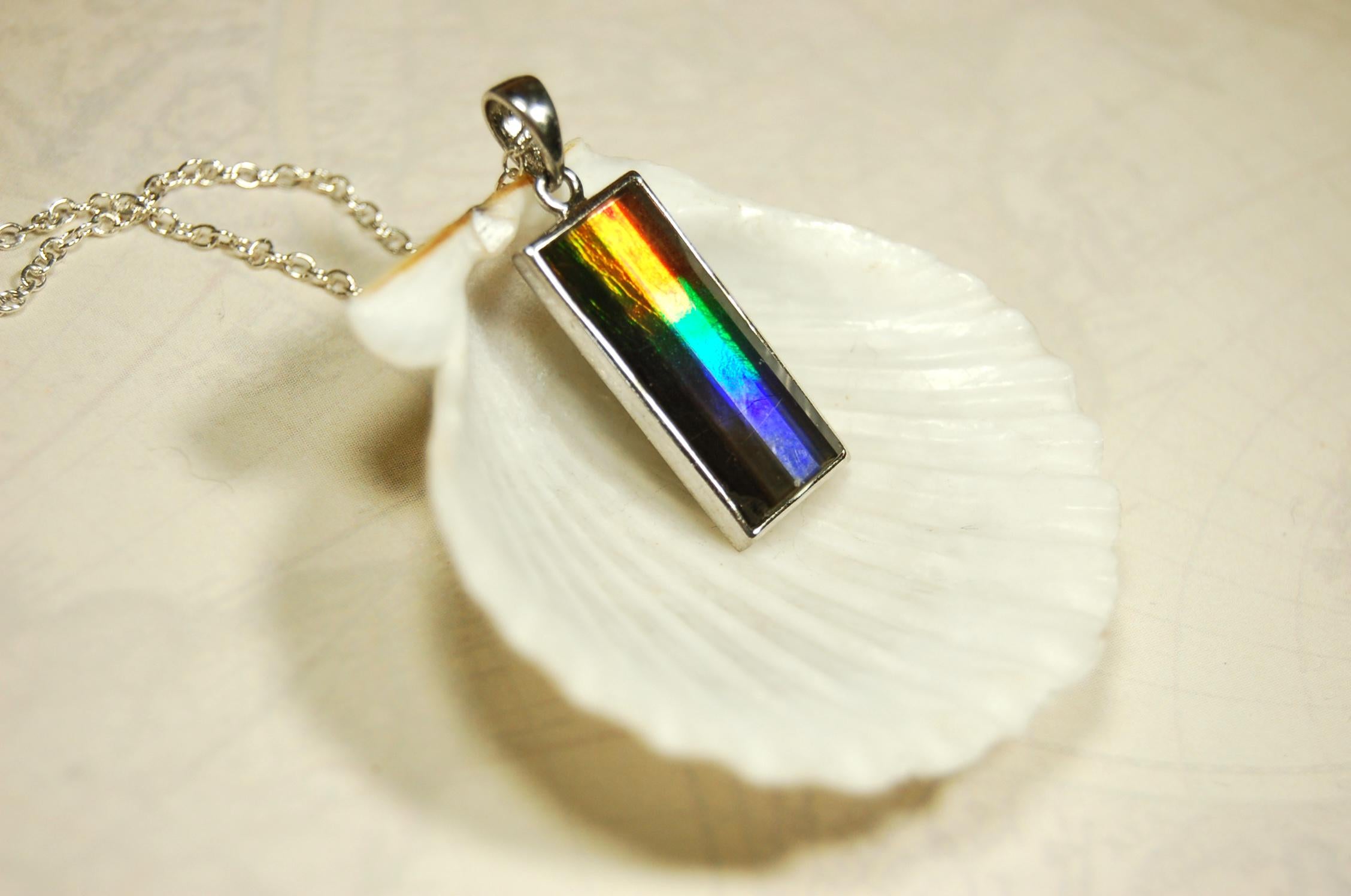 Unisex Jewelry.Ammolite Pendant.Bright Faceted rainbow gem.Price Reduced--see disclosure below in description