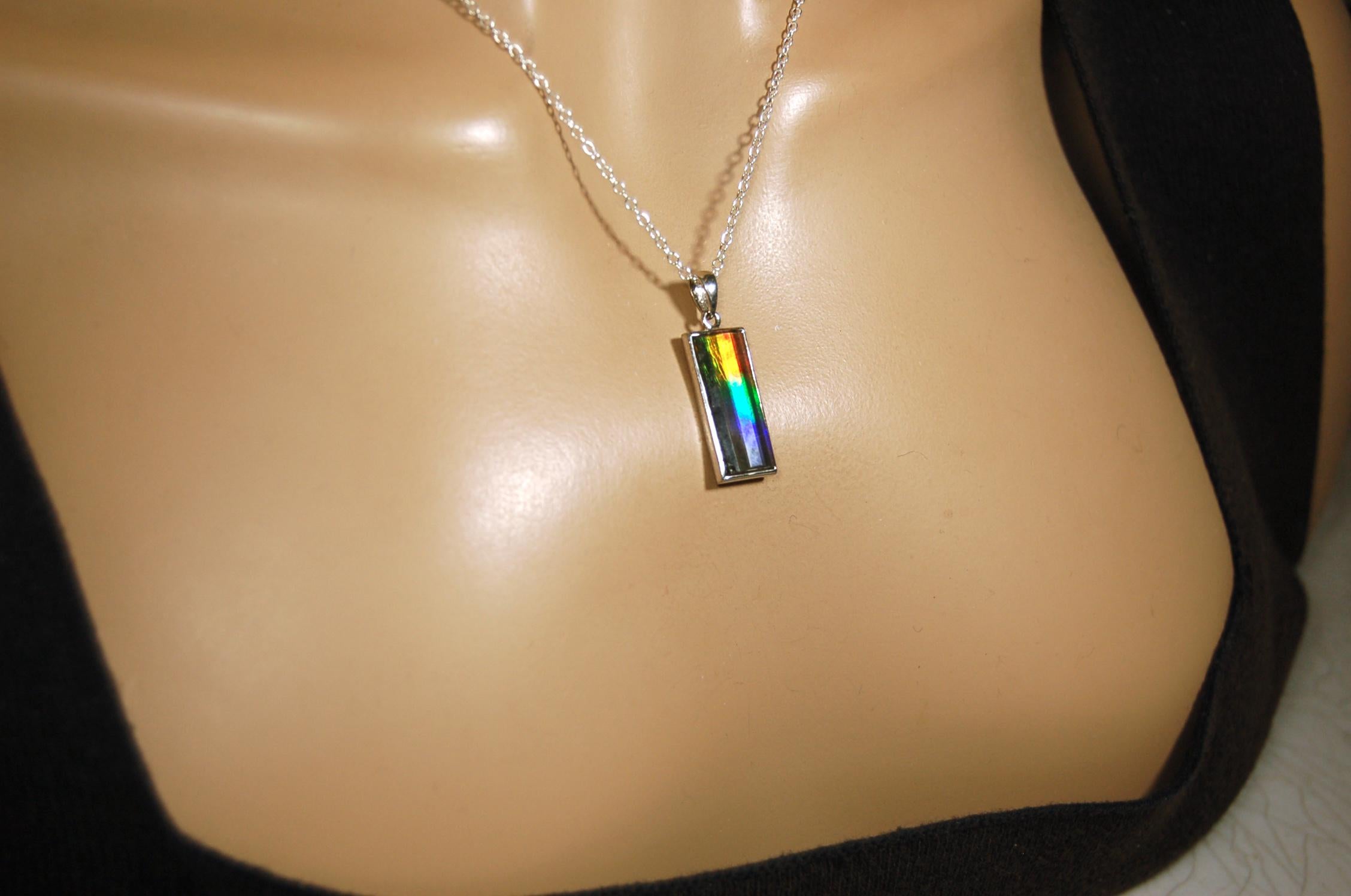 Unisex Jewelry.Ammolite Pendant.Bright Faceted rainbow gem.Price Reduced--see disclosure below in description