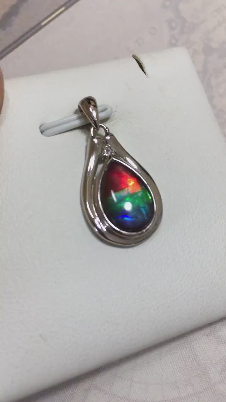 Ammolite pendant.Petite,feminine but very powerful.Rainbow color gem with sapphire.Birthday or Anniversary Gift for wife? 030416