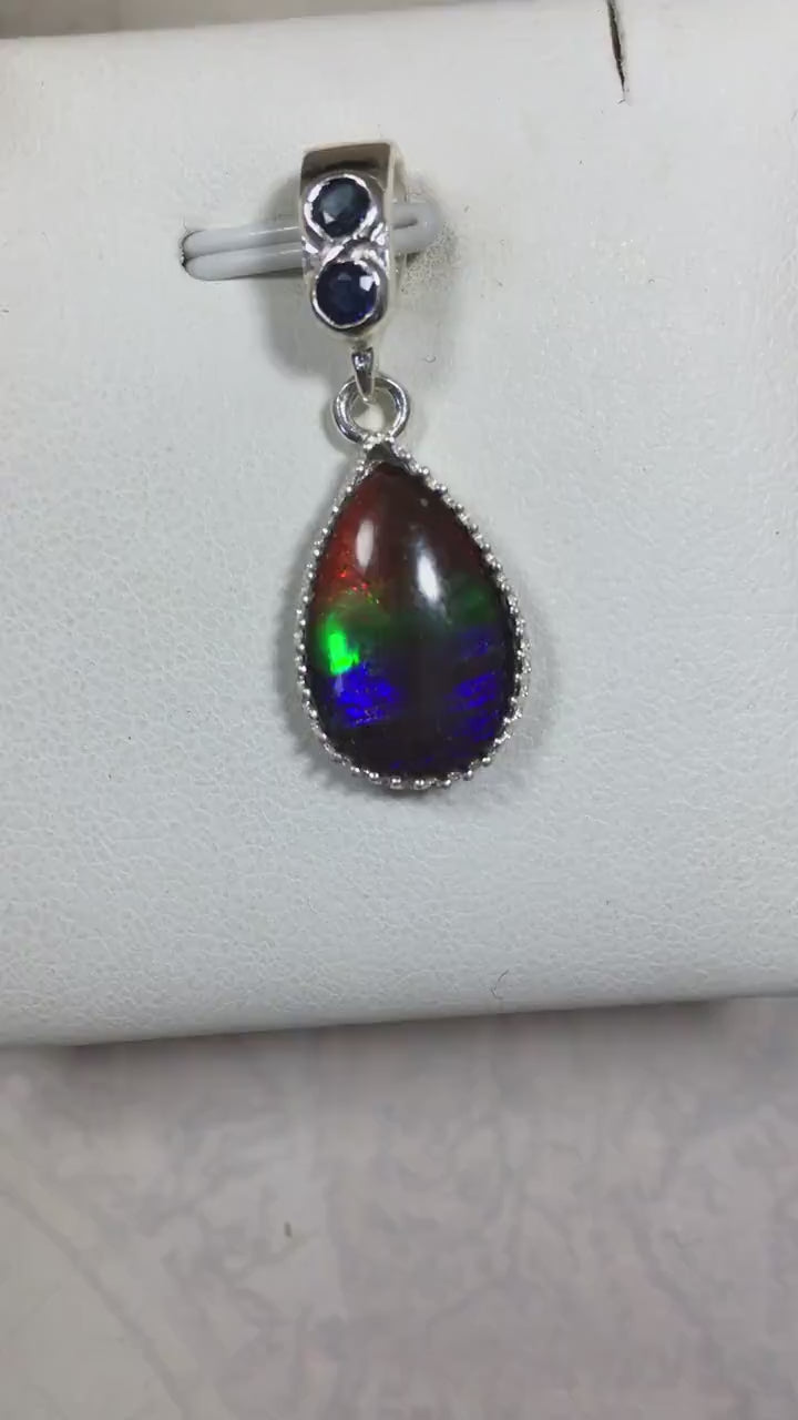 Dainty ammolite pendant.Brilliant color gem.Feminine jewelry.UniqueGift for her.Canadian gemstone.Sterling Silver setting.021126