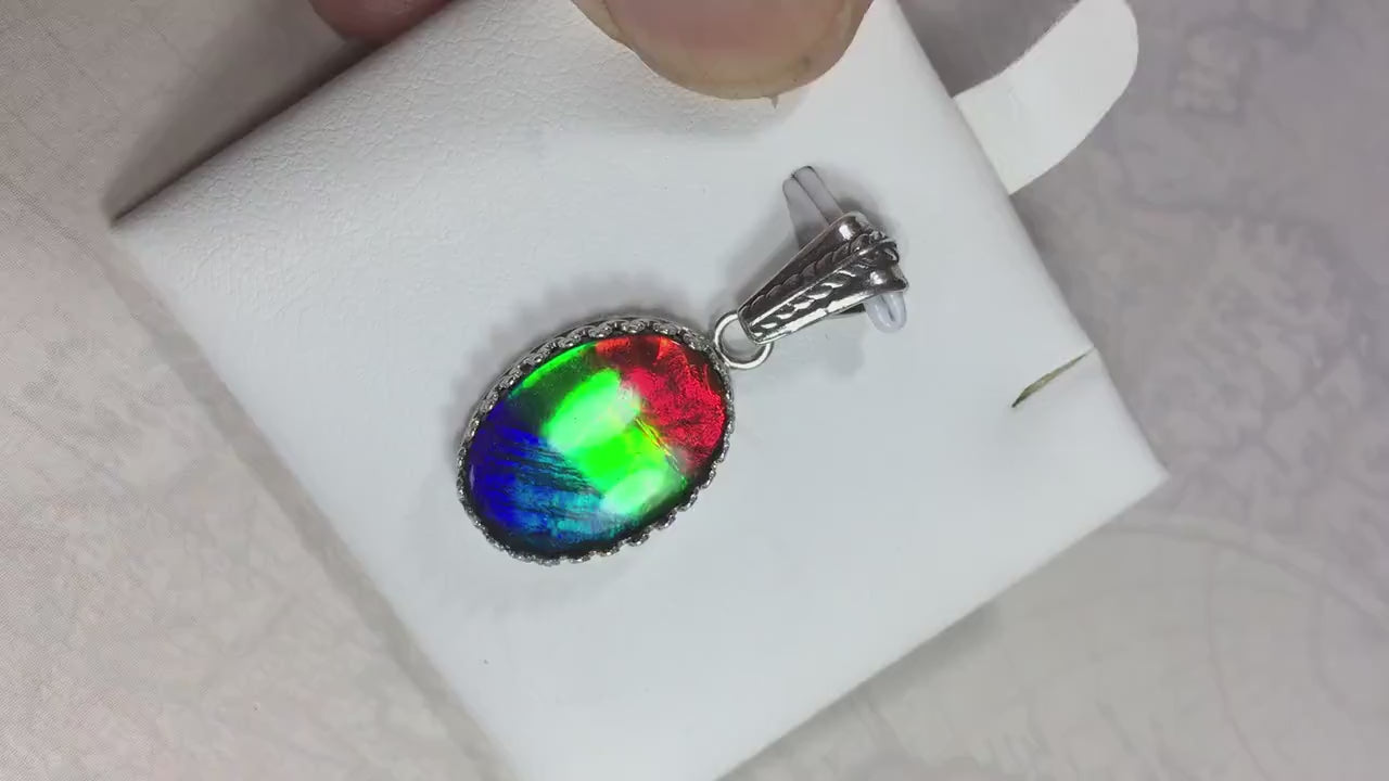 Colorful ammolite pendant - a one-of-a-kind addition to your collection or a perfect gift for someone special"021224